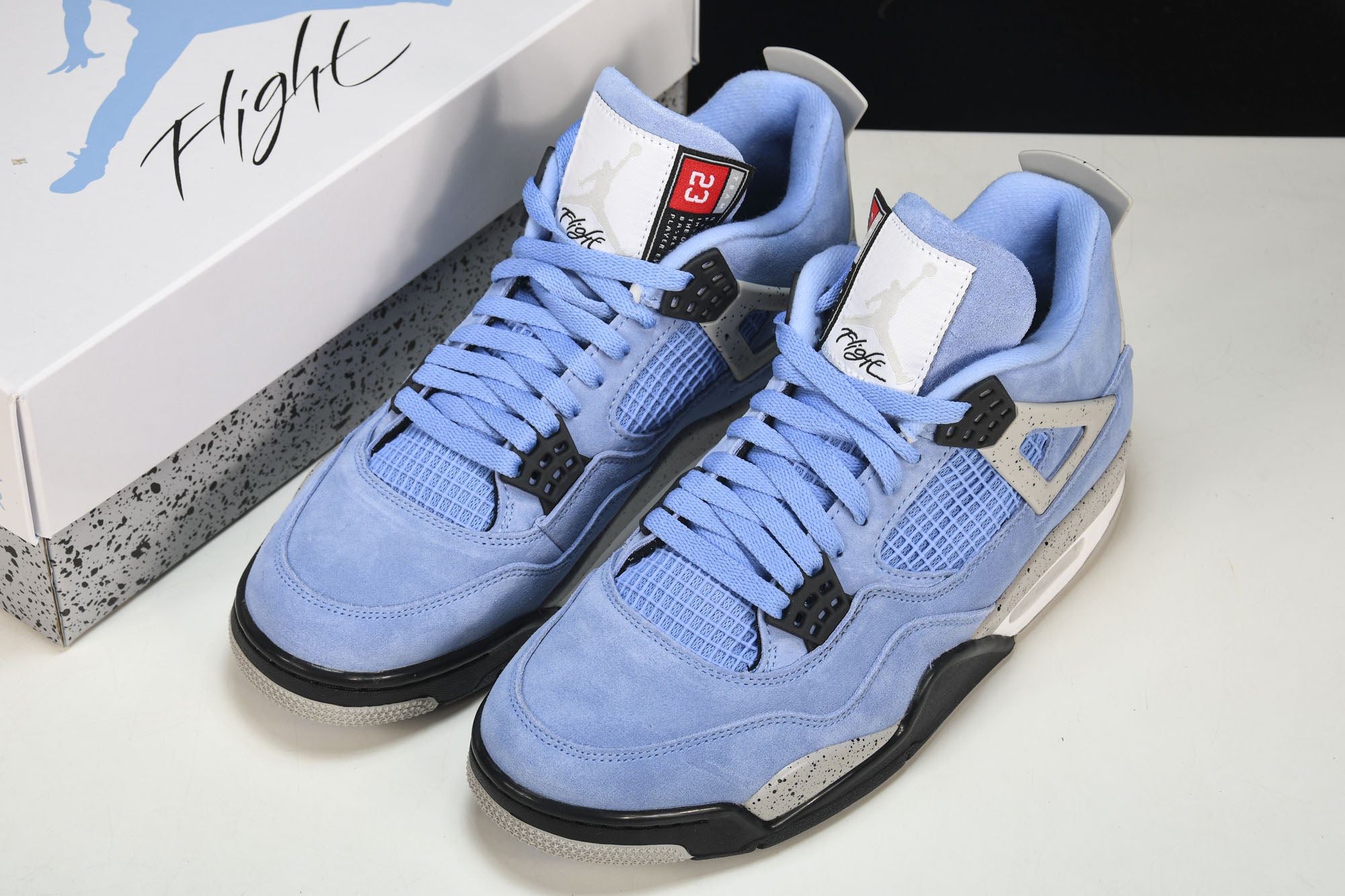 Air Jordan 4 Retro University Blue Sneakers - Iconic Men's Style